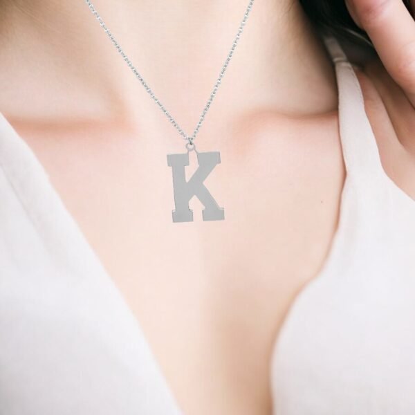 Silver pendant letter K